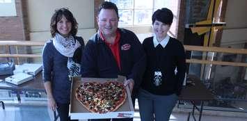 Joe Ciaravino of Antonino's Original Pizza shows off a heart shaped pizza at Windsor Regional Hospital, February 13, 2017.  (Photo by Maureen Revait) 