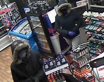 Windsor police are looking for help in identifying these two suspects following multiple convenience store robberies. (Photo courtesy of the Windsor Police Service)