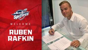 Ruben Rafkin signs his OHL contract with the Windsor Spitfires on July 29, 2019. Photo by Windsor Spitfires-OHL.