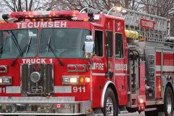 A Tecumseh fire truck on the scene of a house fire in the town on March 9, 2016. (Photo by Ricardo Veneza)