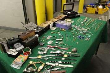 Stolen property recovered by police from a rash of break-ins on the city's east side, July 17, 2014. (Photo by Maureen Revait)