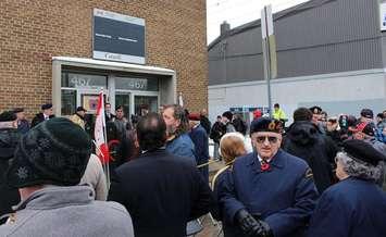 A crowd rallies in front of Windsor's Veterans Affairs Canada office on University Ave., January 31, 2014.