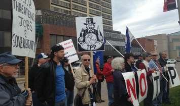 The Windsor District Labour Council holds rally on the riverfront to protest against the signing of the Trans-Pacific Partnership, May 12, 2016. (Photo by Maureen Revait) 
