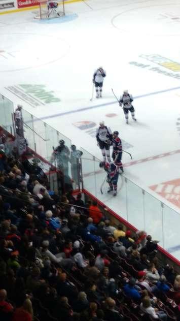 Players from the Windsor Spitfires and Saginaw Spirit plead their cases to officials following a fight in the 2nd period of the Spitfires' 7-1 victory over the Spirit Thurs, Oct 1 at the WFCU Centre (Photo by Mark Brown)