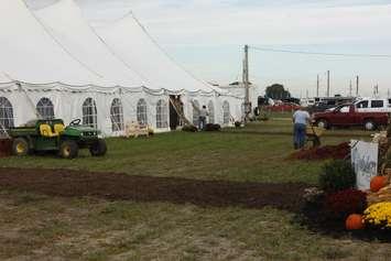 Volunteers prepare the IPM site before the event opens. (Photo by Angelica Haggert)