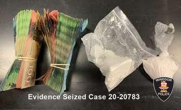 A seizure of suspected cocaine and Canadian cash is shown on July 31, 2020. Photo courtesy Windsor Police Service.