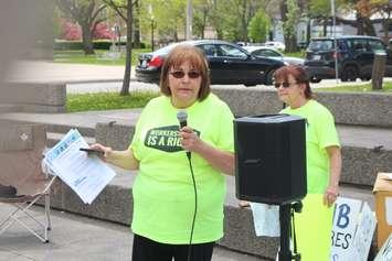 Liz Garant speaks during a Day of Action rally to protect WSIB, Charles Clark Square, Windsor, May 14, 2019. Photo by Mark Brown/Blackburn News.