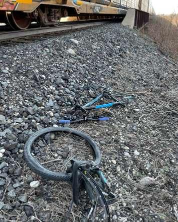 A bicycle is destroyed by a train after two youths were on the tracks in Lakeshore. (Photo via Essex County OPP)