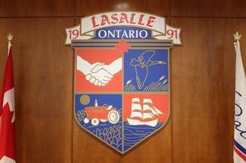 The Town of LaSalle's coat of arms hanging at LaSalle Town Hall. (Photo by Mike Vlasveld)