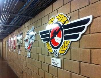 Windsor Spitfires' logos, past and present, in the hallway outside of the team's dressing room at the WFCU Centre. (Photo by Mike Vlasveld.)