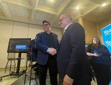 Chris Holt congratulates Drew Dilkens on election results, October 24, 2022. (Photo by Maureen Revait) 