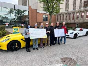 Members of the Corvette Club of Windsor present a $21,000 cheque at Windsor Regional Hospital Met Campus, September 29, 2022. Submitted photo.