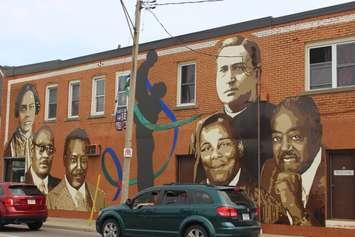 A mural depicting Windsor's black history at the corner of Wyandotte St. E and Dougall Ave. (Photo by Adelle Loiselle)