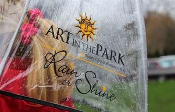 'Art in the Park Rain or Shine' part of the new marketing campaign for the 38th annual festival, April 28, 2016. (Photo by Maureen Revait) 
