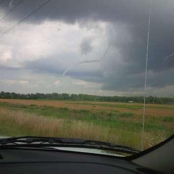 Photo of a funnel clouds developing near Tilbury and Wheatley. July 30, 2014. (Photo courtesy of Bob Wolsing)