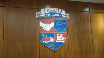 The coat-of-arms for the town of LaSalle, in council chambers. Blackburn News file photo.