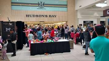 Families line up for activities on Family Day at Devonshire Mall in Windsor on Feb 20, 2017 (Photo by Mark Brown/Blackburn News)