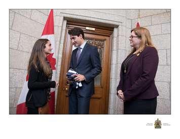 Windsor's Jada Malott (left) meets Prime Minister Justin Trudeau (centre) in Ottawa with Essex MP Tracey Ramsey (right) on October 5, 2016. (Photo courtesy Michael Malott)