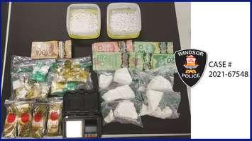 Cocaine and cash seized in a raid in Windsor is shown on September 2, 2021. Photo provided by Windsor Police Service.
