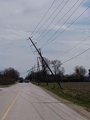 A damaged hydro line is seen on Disputed Rd in LaSalle. Photo courtesy LaSalle Police Service/Twitter.
