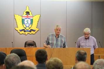 Chatham-Kent-Essex MPP Rick Nicholls (right) and Haldimand-Norfolk MPP Toby Barrett (left), the PC agriculture critic, hold a town hall at the Leamington Municipal Building on July 25, 2016. (Photo by Ricardo Veneza)