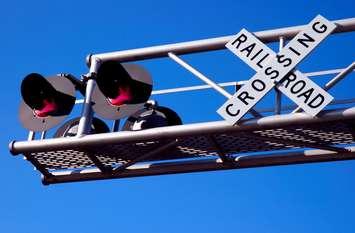 Train crossing sign. (Photo courtesy of © CanStockPhoto.com/Jerryb9)