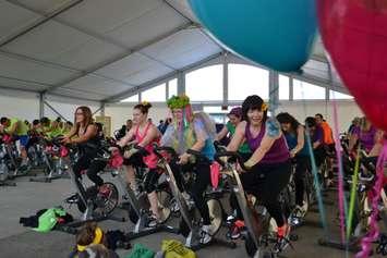 YMCA members cycle for a good cause during the Sweat for Strong Kids event in 2015. (Photo courtesy of the YMCA)