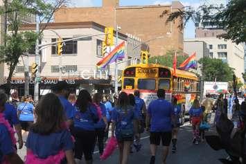 Crowds move along Ouellette Ave during the Windsor PrideFest Parade, August 13, 2017. Photo by Mark Brown/Blackburn News.