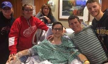 Shawn Florence surrounded by friends after a ski accident left him paralyzed. (Photo courtesy of gofundme.com/gofundshawn)