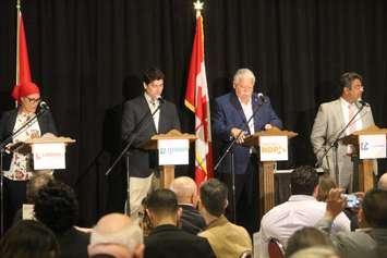 Windsor West MPP candidates Remy Boulbol, left, Liberal; Henry Oulevey, Green; Percy Hatfield, NDP and Mohammad Latif, PC, prepare to debate at the Ciociaro Club, Tecumseh, May 17, 2018. Photo by Mark Brown/Blackburn News.