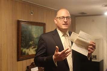 Windsor Mayor Drew Dilkens shows off a letter that had been placed in a 1988 time capsule at the Francois Baby House in Windsor, May 4, 2018. Photo by Mark Brown/Blackburn News.