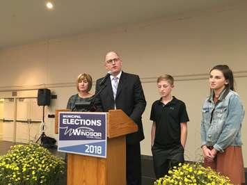 Windsor Mayor Drew Dilkens gives his victory speech after being re-elected to a second term, with his family looking on, at the St. Clair Centre for the Arts, October 22, 2018. Photo by Paul Pedro/Blackburn News.
