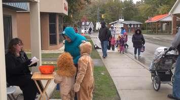 Children trick or treating at the safety village
