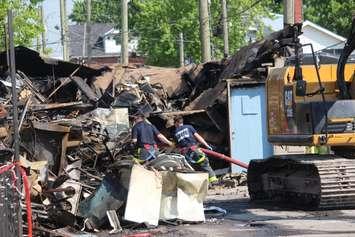 The investigation into Monday's fire on Wyandotte St. E between Parent Ave. and Marentette St. in Windsor continues.  (Photo by Adelle Loiselle)