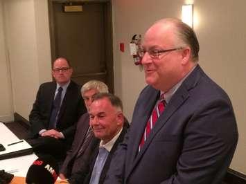 WEEDC CEO Stephen MacKenzie (front right) is introduced by (from left to right) Windsor Mayor Drew Dilkens, Essex Warden Tom Bain and WEEDC Board Chair Marty Komsa, August 8, 2016. (Photo by Mike Vlasveld)