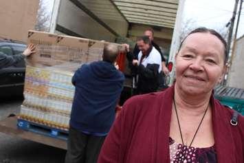 Street Help Homeless Centre administrator Christine Wilson-Furlonger receives the largest ever food donation on December 15, 2014. (Photo by Jason Viau)