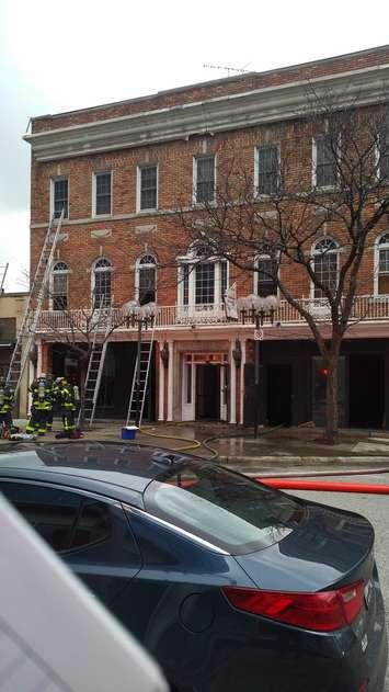 Fire crews are seen outside the former Pour House restaurant on Chatham St W in Windsor after fire broke out (Photo courtesy of the Windsor Fire and Rescue Service)