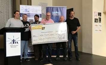 Members of CUPE Local 27 hand over a cheque to the Downtown Mission in Windsor May 17, 2019. (Photo courtesy of the Downtown Mission)