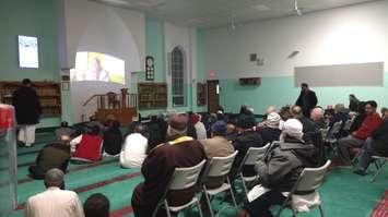 An audience watches the conclusion of a documentary on the Quebec City mosque shooting at the Windsor Islamic Association, January 29, 2018. Photo by Mark Brown/Blackburn News.