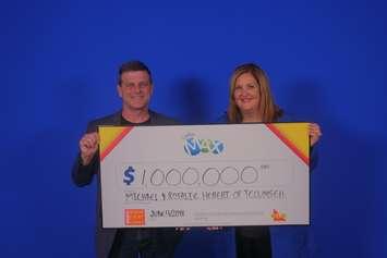 Michael and Rosalie Hebert claim their prize at the OLG Prize Centre in Toronto. Photo courtesy OLG.