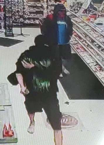 Windsor police are looking for these two suspects in the robbery of a convenience store in the early morning hours on August 13, 2018. Photo provided by Windsor Police Service.