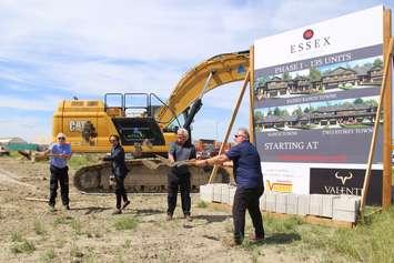 Essex Mayor Larry Snively, second from right, helps break ground on a new housing development on June 16, 2021. Photo provided by Town of Essex.