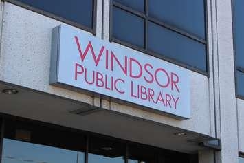 The sign to the Dufferin Pl. entrance of the Windsor Public Library branch on Ouellette Ave.  seen on July 12, 2016. (Photo by Ricardo Veneza)