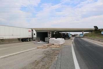 A tractor trailer overturns on the eastbound 401 near Tilbury, spilling a load of baking soda. Photo courtesy of OPP.
