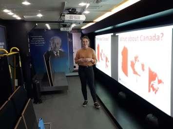 Emily Barsanti-Innes, an education associate with the Friends of Simon Wiesenthal Center for Holocaust Studies, shows off the Tour For Humanity mobile unit on tour in Windsor-Essex, April 3, 2019. Photo by Mark Brown/Blackburn News.