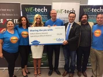 The Libro Credit Union donates money to WE Tech Alliance, September 1, 2016. (Photo by Mike Vlasveld)