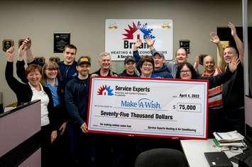 Employees at Bryant Heating and Cooling present a $75,000 cheque to Make-A-Wish Canada, April 4, 2022. Submitted photo by Nic Antaya.