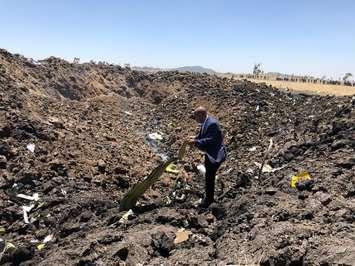 The CEO of Ethiopian Airlines at the site of a deadly plane crash on March 10, 2019 (Photo via Ethiopian Airlines Facebook) 