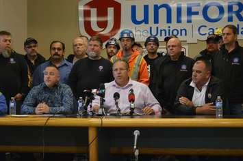 Unifor Local 444 president Dave Cassidy, centre, discusses the cutting of the Ontario College of Trades as Karl Lovett of IBEW Local 773, left, and Mike Meloche of UA Local 527, right listen on October 26, 2018. Photo by Mark Brown/Blackburn News.