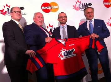 Left to right, Windsor Mayor Drew Dilkens, OHL Commissioner David Branch, MasterCard VP Milos Vranesevic and Spitfires Governor and Chair of Host Committee John Savage, May 2, 2016. (Photo by Mike Vlasveld)